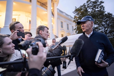 U.S. President Joe Biden speaks to reporters outside the White House in Washington on Friday. 