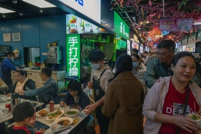 The Dongmenting night market in Shenzhen, China, on Feb. 12. Hong Kong residents are flocking to nearby mainland cities in record numbers for cheaper shopping and entertainment.