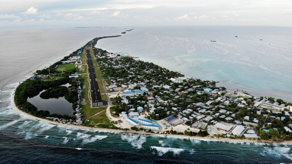 An aerial view of downtown Funafuti and the airport runway in 2019