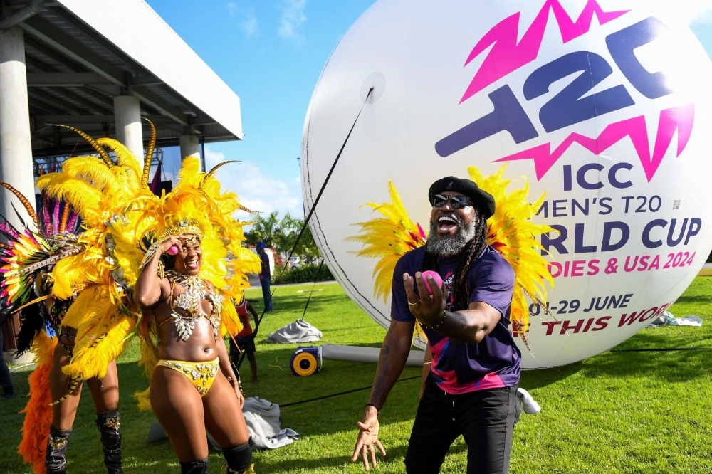 Chris Gayle of the West Indies poses at an event to mark 100 days until the start of the ICC Men's T20 World Cup, in Bridgetown, Barbados, on Feb. 22. The 2024 tournament will be hosted by the West Indies and the U.S. from June 1 to 29.