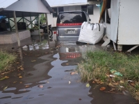 A flooded entrance to a house after high tides in Funafuti in February. | Tuvalu Meteorological Service / via REUTERS 