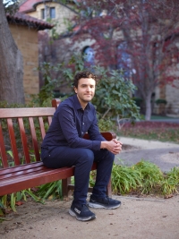 Yannai Kashtan, a Ph.D. candidate, on the Stanford University campus on Dec. 16. “Exxon did offer me internships that were basically like — let’s get more oil out the ground efficiently,” Kashtan said. | Damon Casarez / The New York Times