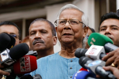 Bangladeshi Nobel peace laureate Muhammad Yunus addresses the media as he prepares to leave after filing an appeal for the extension of his bail at the Labor Appellate Tribunal in Dhaka on Sunday.