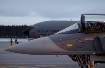 A Swedish JAS Gripen fighter jet next to a U.S. plane at Kallax Air Base, Sweden, on Monday. Swedish armed forces joined NATO for exercises on Monday, contributing troops, helicopters and fighter jets as the alliance carries out its largest set of military drills since the end of the Cold War.