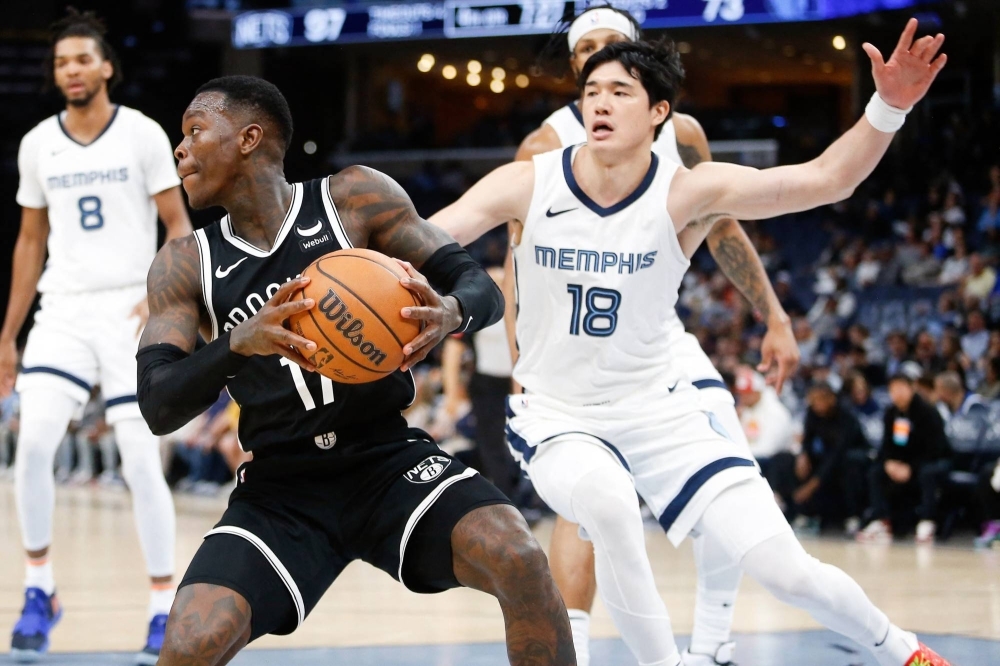 Memphis Grizzlies forward Yuta Watanabe (right) defends during a game against Brooklyn Nets in Memphis, Tennessee, on Feb. 26.