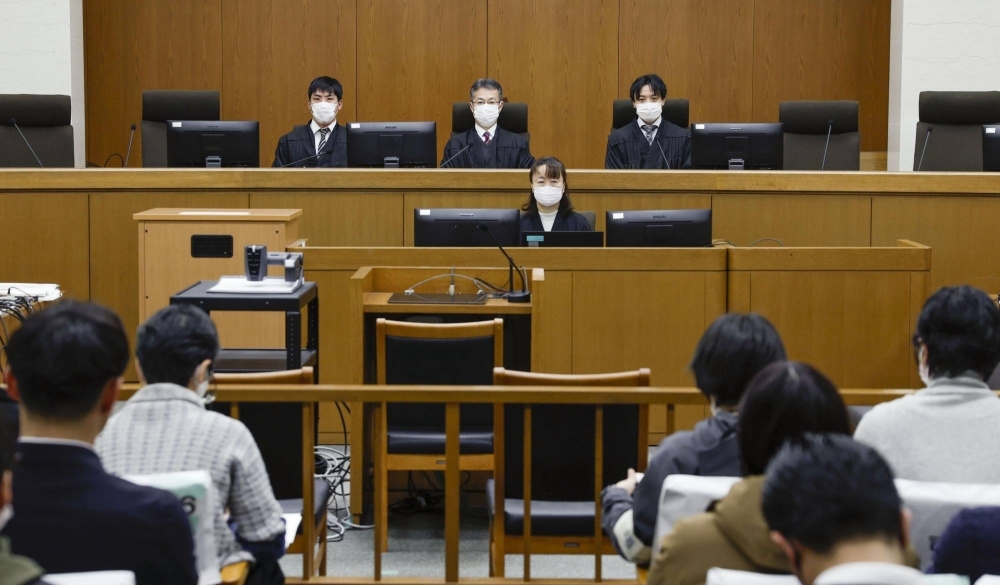 Judges at the Kyoto District Court hear a case involving Yoshikazu Okubo, a doctor accused of the consensual killing of a woman with a fatal neurological disease, on Jan. 11.