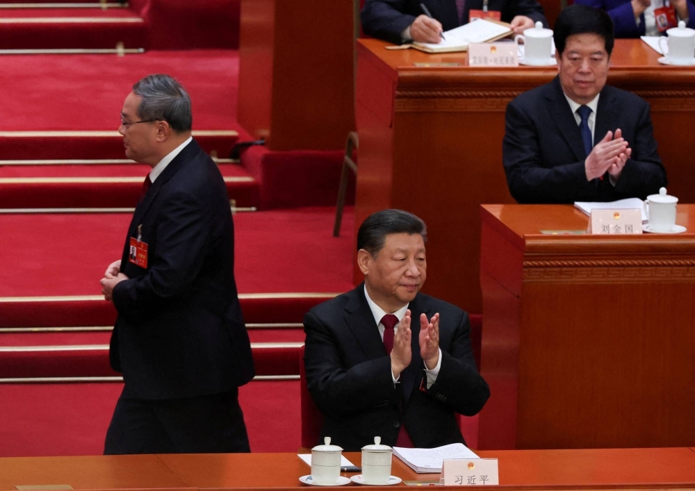 Chinese leader Xi Jinping attends the opening session of the National People's Congress (NPC) at the Great Hall of the People in Beijing on Tuesday.