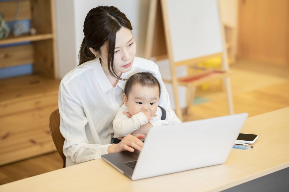 Beyond factors such as the "motherhood penalty," Japanese women struggle to advance in their careers due to the structure of the workforce, including the two-tiered clerical versus managerial track.