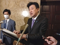 Defense Minister Minoru Kihara told reporters that the U.S. formally made the request on Thursday evening. | KYODO