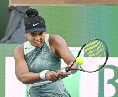 Naomi Osaka hits a return against Sara Errani during their first-round match at the BNP Paribas Open in Indian Wells, California, on Thursday.