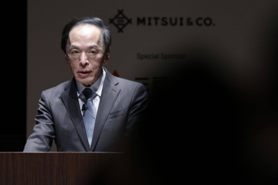 Kazuo Ueda, governor of the Bank of Japan, speaks at a fintech summit in Tokyo on Tuesday. 