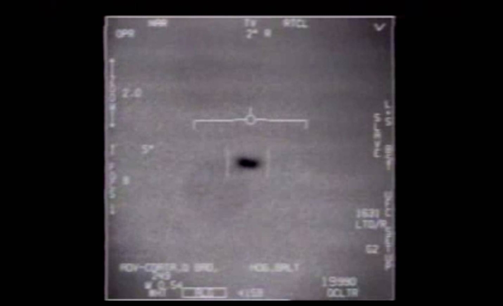 An image taken from video of a U.S. Navy F/A-18 jet crew’s encounter with an unexplained anomalous phenomena