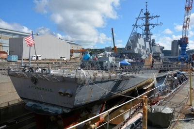 The U.S. Navy's USS Fitzgerald guided-missile destroyer sits in Dry Dock 4 for continued repairs and assessment of damage it sustained during a June 2017 collision with a merchant vessel, in Yokosuka, Kanagawa Prefecture, in July 2017.
