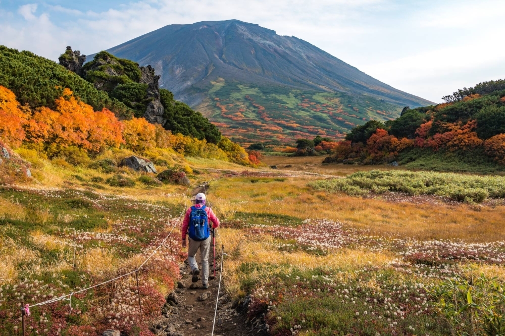 A hiker walks toward Asahidake in Hokkaido. The health and environmental issues around PFAS could be a particular problem for Japan, which boasts a number of globally renowned outdoor brands and related suppliers.