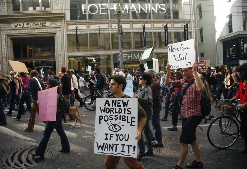 Anti-capitalist protesters with Occupy San Francisco take part in a demonstration on the streets of the Californian city in October 2011.
