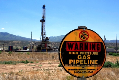 A sign warns of underground natural gas pipelines outside Rifle, Colorado, in June 2012.