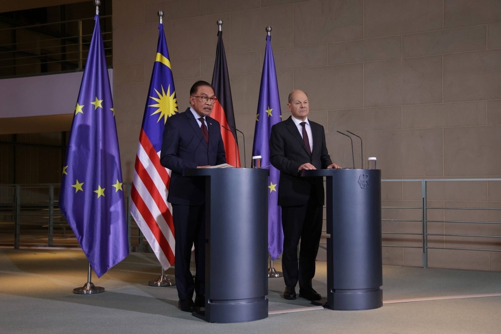 German Chancellor Olaf Scholz and Malaysian Prime Minister Anwar Ibrahim hold a joint press conference at the Chancellery in Berlin on Monday.
