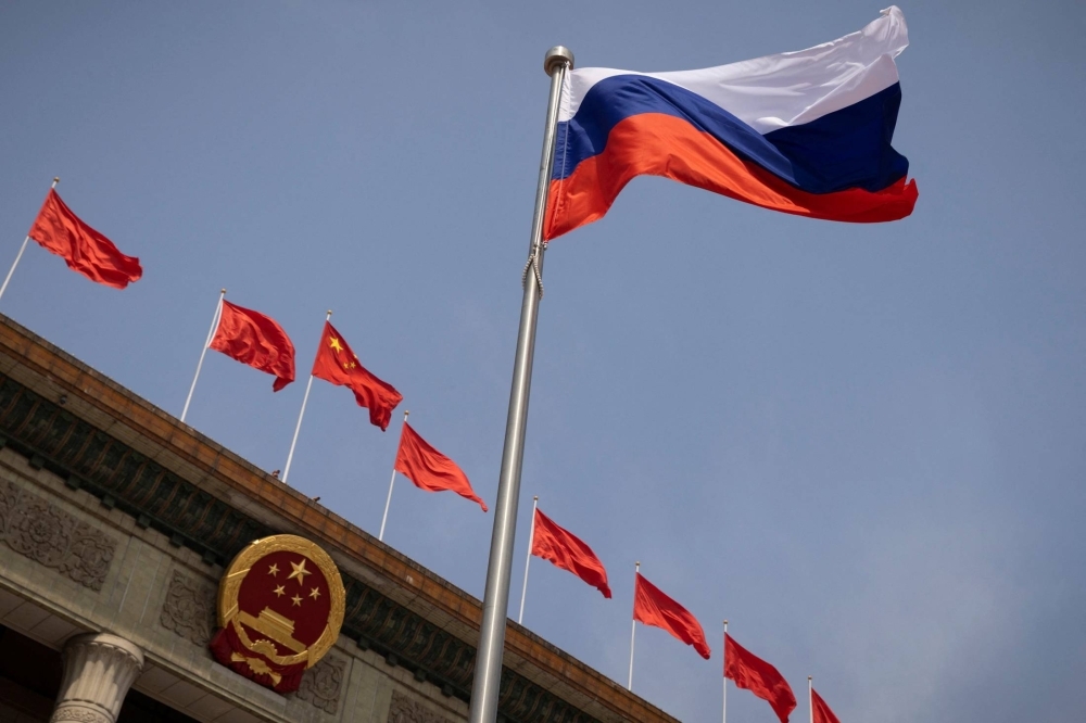 The Russian national flag flies in front of the Great Hall of the People in Beijing in May 2023. Trade between China and Russia has been increasing since the start of the Ukraine war. 