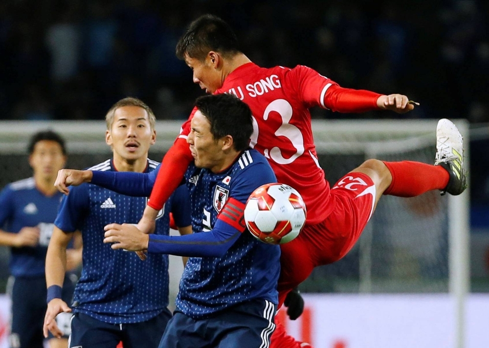 The men's soccer teams of North Korea and Japan clash in the East Asian Football Championship in Tokyo in December 2017.