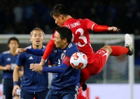 The men's soccer teams of North Korea and Japan clash in the East Asian Football Championship in Tokyo in December 2017. | Reuters
