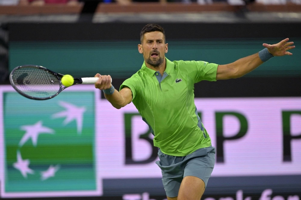Novak Djokovic hits a shot in his third-round match against Luca Nardi in the BNP Paribas Open in Indian Wells, California, on Monday.