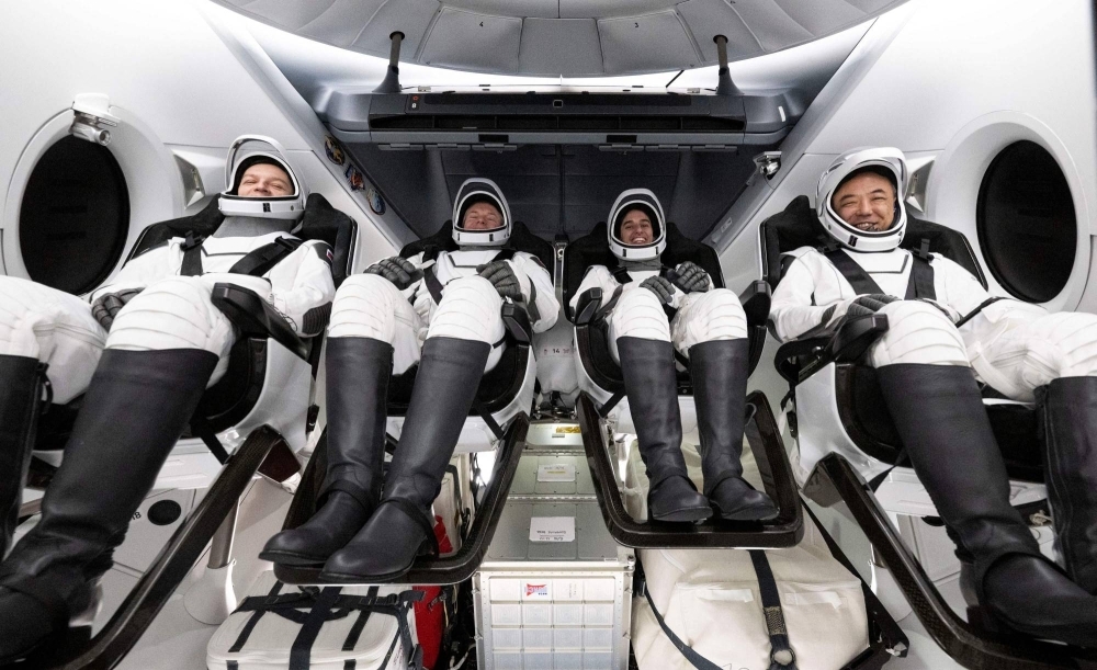 From left: Russian cosmonaut Konstantin Borisov, Danish astronaut Andreas Mogensen, American astronaut Jasmin Moghbeli and Japanese astronaut Satoshi Furukawa sit inside the SpaceX Dragon Endurance spacecraft as they are recovered by the SpaceX ship MEGAN shortly after splashdown in the Gulf of Mexico off the coast of Pensacola, Florida, on Tuesday.