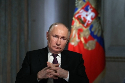 Russian President Vladimir Putin gives an interview at the Kremlin in Moscow on Tuesday. 