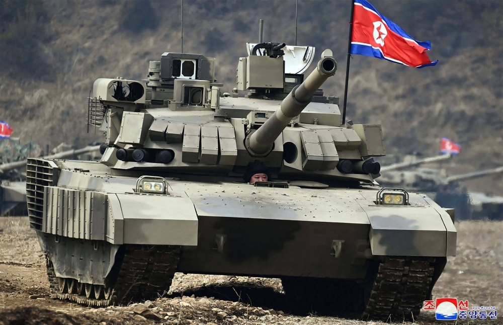 North Korean leader Kim Jong Un sits in the driver's seat of a new battle tank on Wednesday.