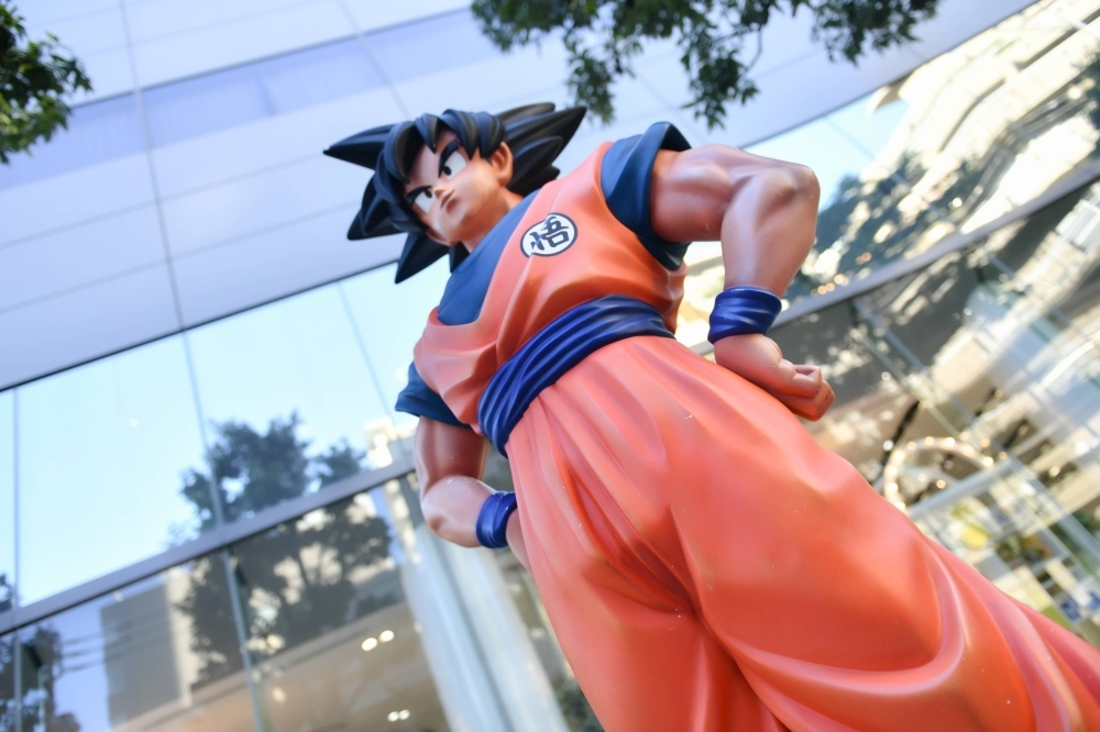 A statue of "Dragon Ball" character Goku stands outside the offices of Bandai Namco in Tokyo. The figure is now as recognizable as such characters as Mickey Mouse and Spider-Man. 