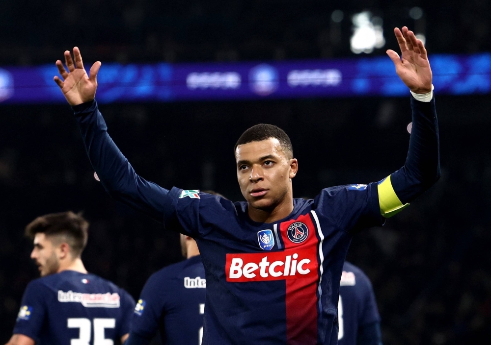 Paris Saint Germain's Kylian Mbappe celebrates scoring his team's first goal against OGC Nice in Paris on Wednesday.