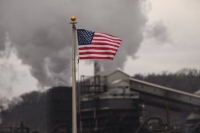 A U.S. flag flies near the United States Steel Clairton Coke Works facility in Clairton, Pennsylvania, on Friday. | BLOOMBERG