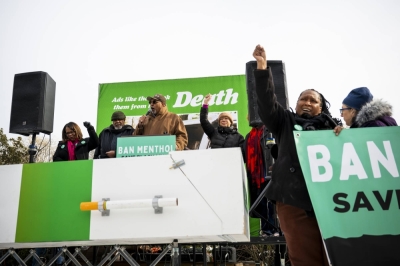Members of the African American Tobacco Control Leadership Council stage a "menthol funeral" to draw attention to the annual toll of smoking-related deaths outside the White House in Washington on Jan. 18.