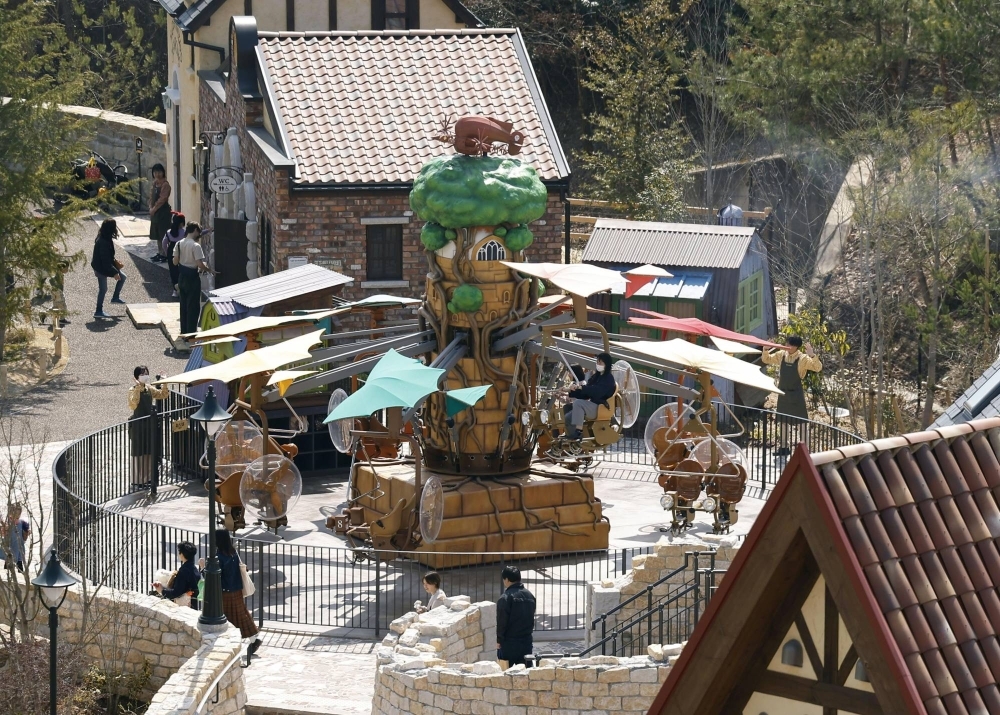 The new Valley of Witches area of the Ghibli Park in Nagakute, Aichi Prefecture, is opened on Saturday morning.
