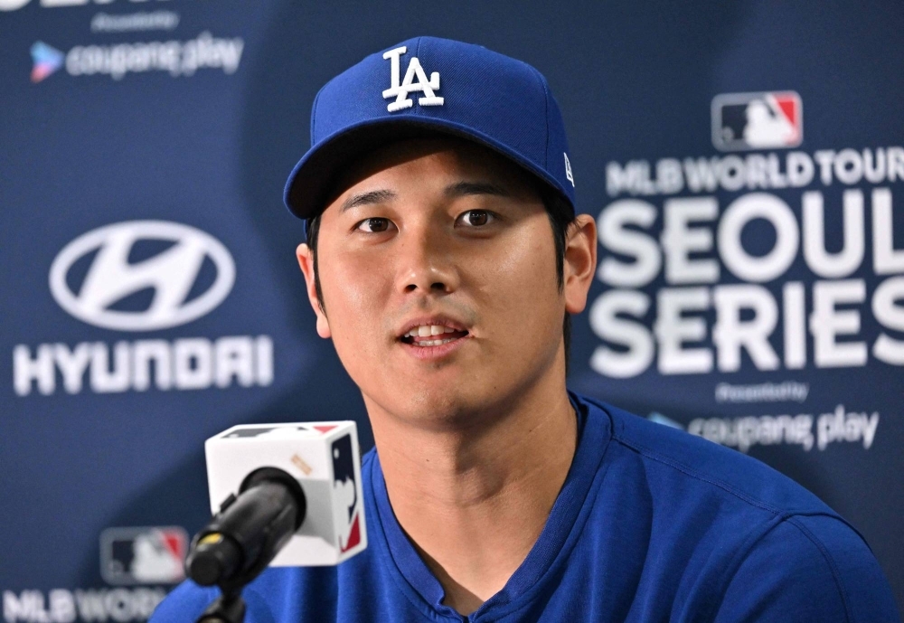 Dodgers star Shohei Ohtani says he is focused on baseball despite all the hype surrounding his Dodgers debut in Seoul next week. 