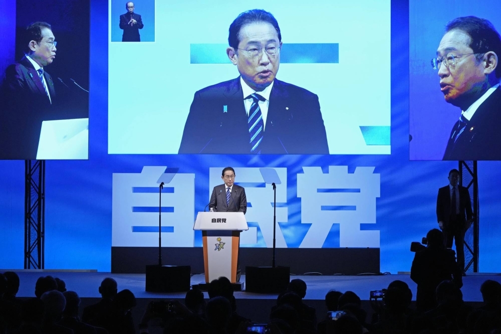 Prime Minister Fumio Kishida addresses the Liberal Democratic Party's annual convention in Tokyo on Sunday.