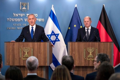 Israeli Prime Minister Benjamin Netanyahu (left) speaks during a joint news conference with German Chancellor Olaf Scholz following their meeting in Jerusalem on Monday.