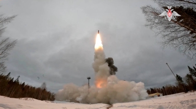 An intercontinental ballistic nuclear missile is fired during a training exercise, in Northern Arkhangelsk region, Russia.