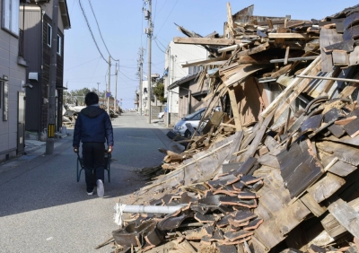 A street in Wajima, Ishikawa Prefecture, is still filled with rubble on March 16, more than two months after the Jan. 1 quake.
