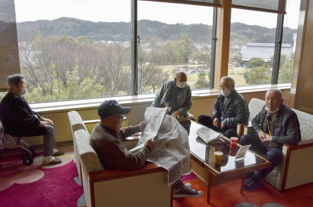 Evacuees from hard-hit areas in the Noto Peninsula earthquake take refuge at an inn in Kaga, Ishikawa Prefecture, on March 8.