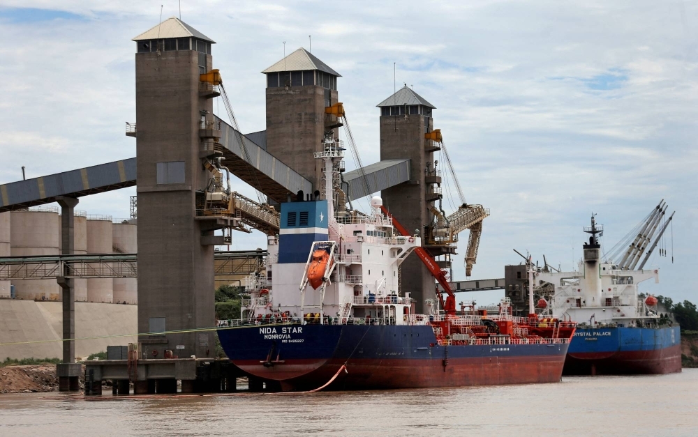 Grain is loaded onto ships for export at a port on the Parana river near Rosario, Argentina, in January 2017.