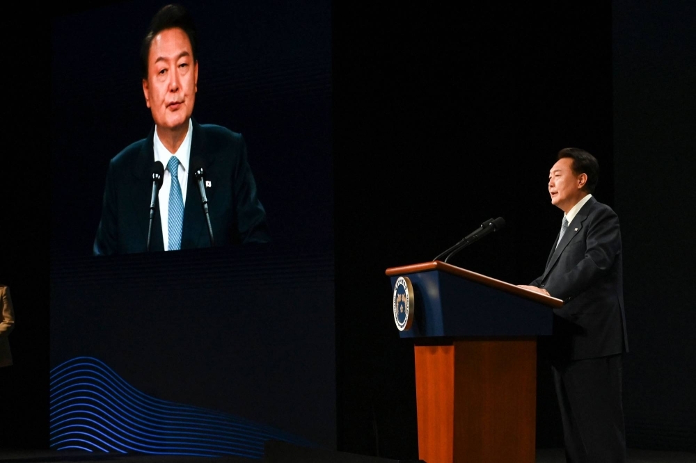 South Korean President Yoon Suk-yeol delivers remarks during the Third Summit for Democracy in Seoul on Monday.