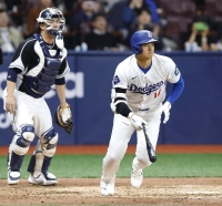 Los Angeles Dodgers designated hitter Shohei Ohtani grounds out in the fourth inning of an exhibition game against South Korea's national team at Seoul's Gocheok Sky Dome on Monday. | Kyodo