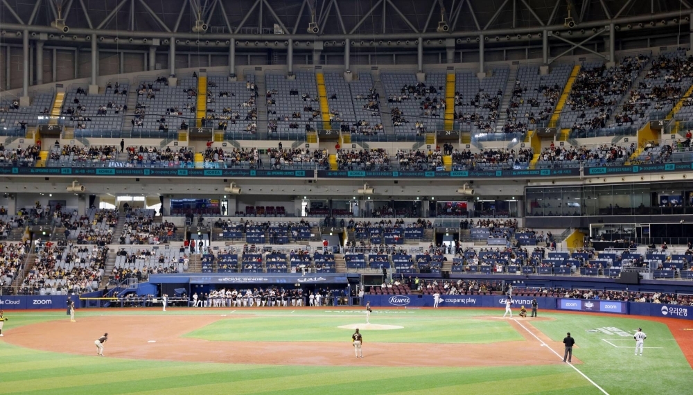 Many empty seats are seen during an exhibition baseball game between the San Diego Padres and South Korea's LG Twins on Monday at Seoul's Gocheok Sky Dome.