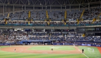 Many empty seats are seen during an exhibition baseball game between the San Diego Padres and South Korea's LG Twins on Monday at Seoul's Gocheok Sky Dome. | Kyodo