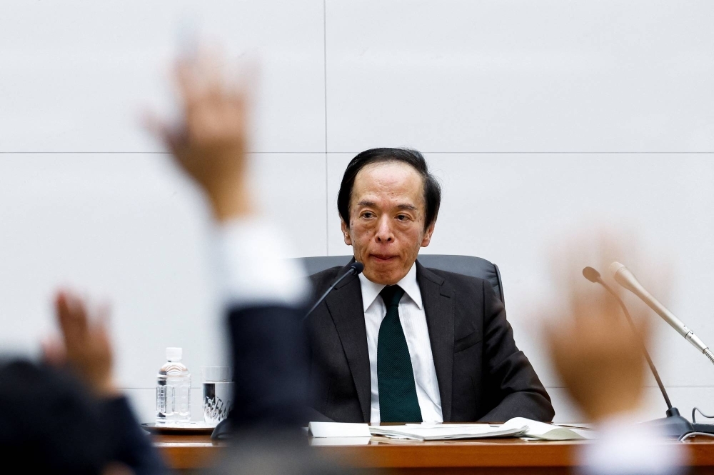 Bank of Japan Gov. Kazuo Ueda attends a news conference after a policy meeting at the bank's headquarters in Tokyo on Tuesday.
