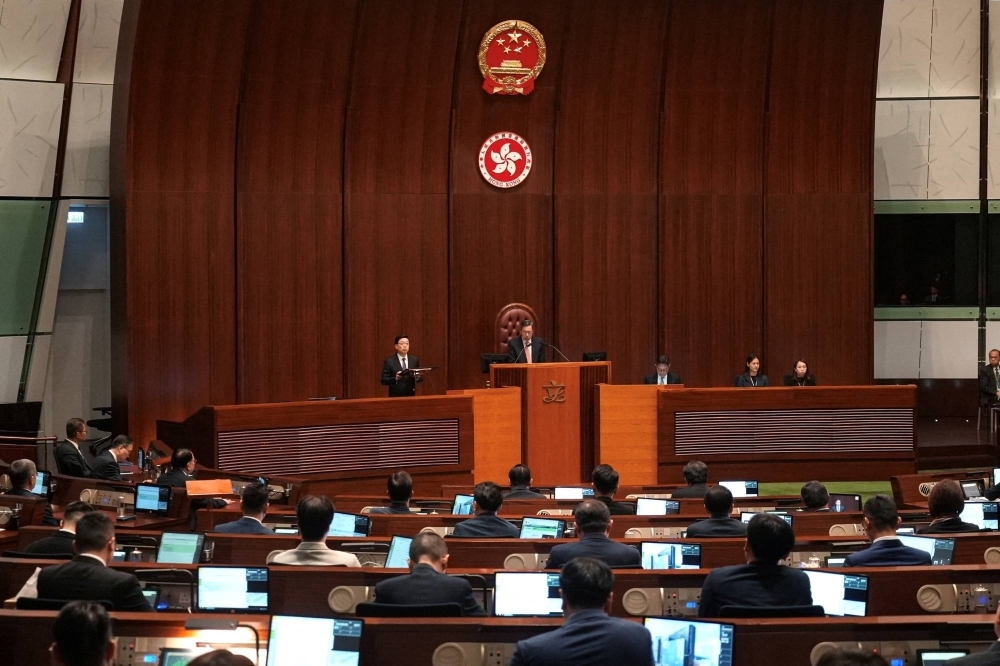 Hong Kong Chief Executive John Lee delivers a speech after the new national security law was passed on Tuesday.