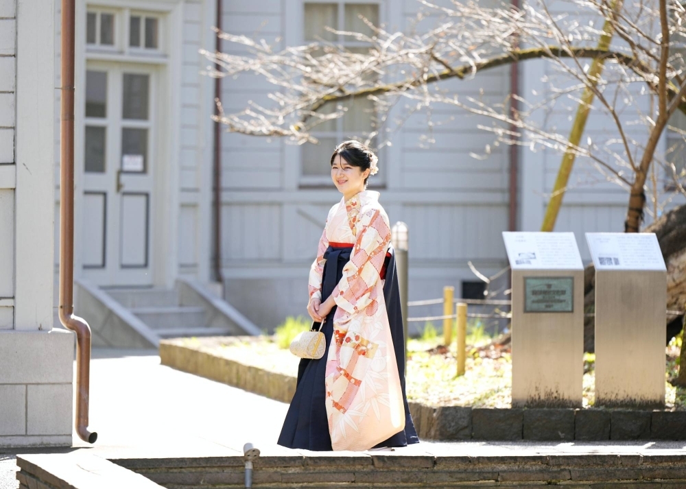 Princess Aiko heads to the graduation ceremony at Gakushuin University in Tokyo on Wednesday.
