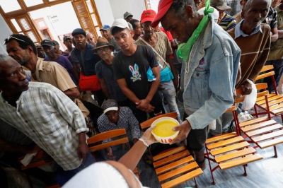 A soup kitchen distributes food in Havana on Jan. 15. The communist government of Cuba is grappling with its worst economic situation since the collapse of the Soviet Union more than three decades ago.