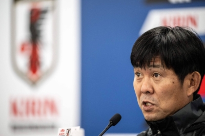 Japan head coach Hajime Moriyasu holds a news conference in Tokyo on Wednesday. 