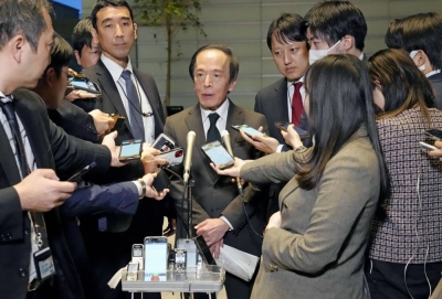 Bank of Japan Gov. Kazuo Ueda speaks to reporters after meeting with Prime Minister Fumio Kishida on Tuesday in Tokyo. 
